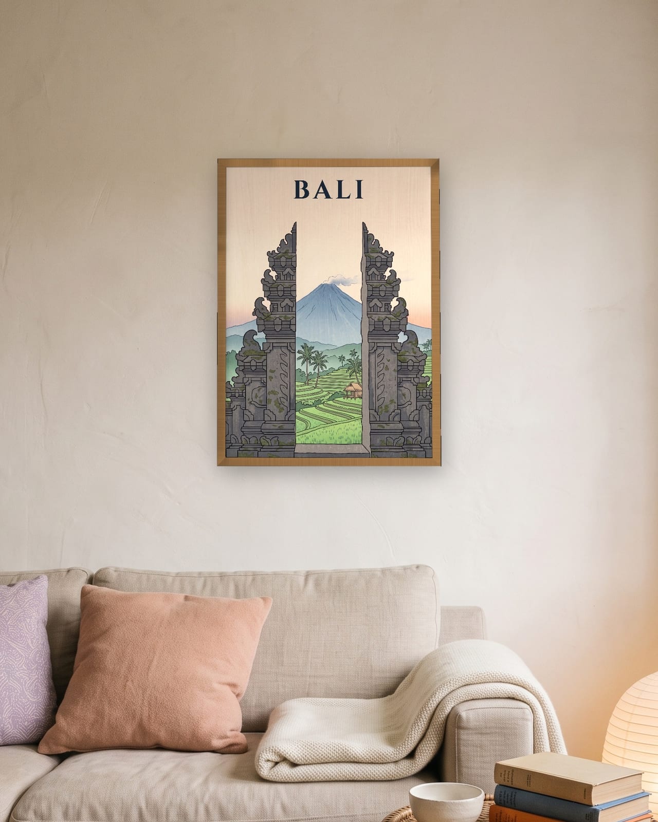Bali Temple Gate print, natural oak frame A3 above a linen sofa